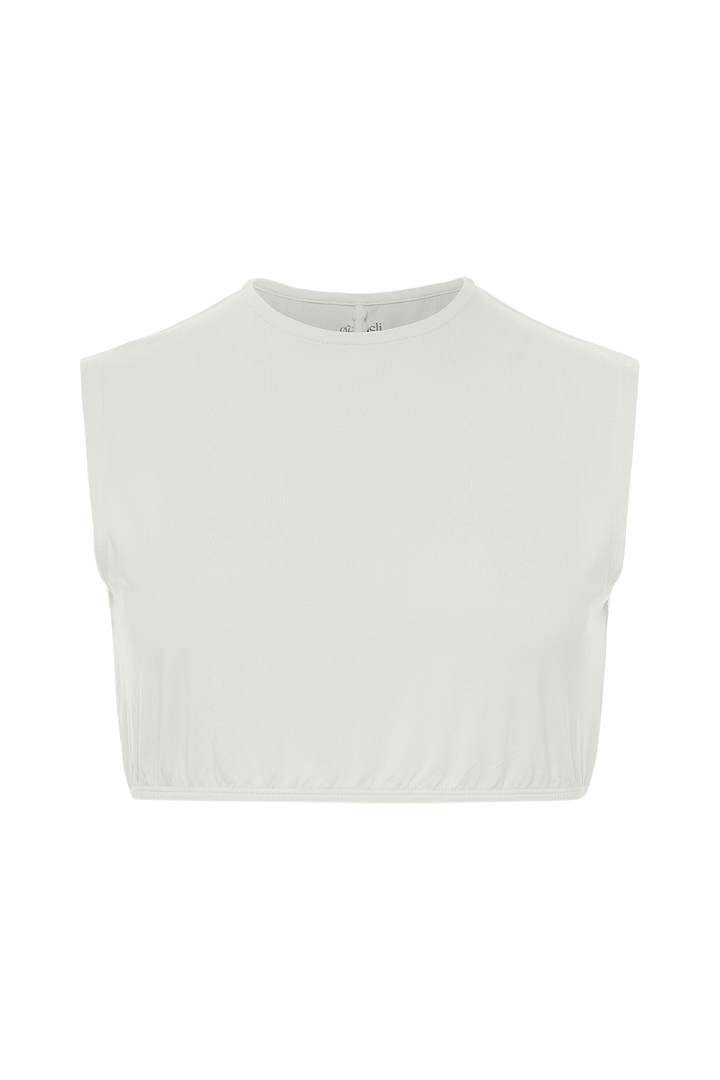 White sleeveless top on a white background