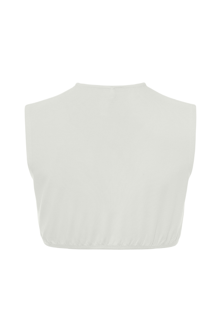 White sleeveless top on a white background
